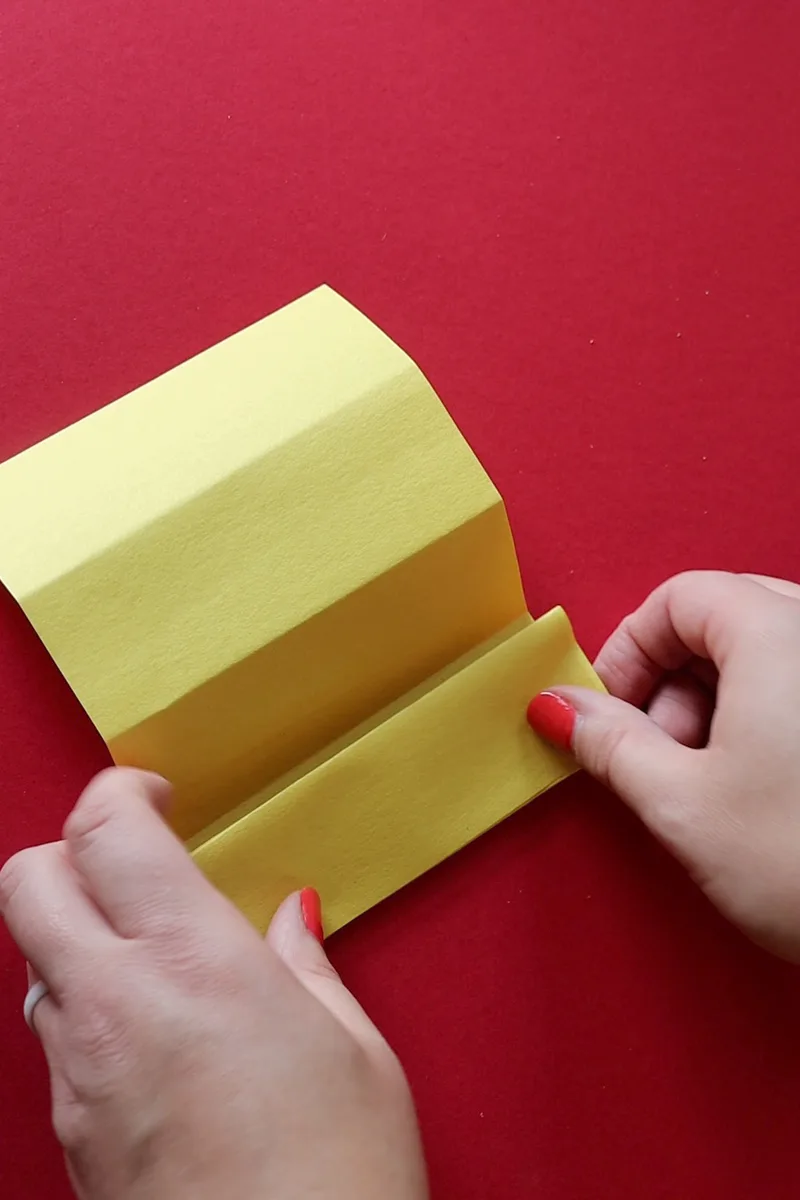 folding yellow paper